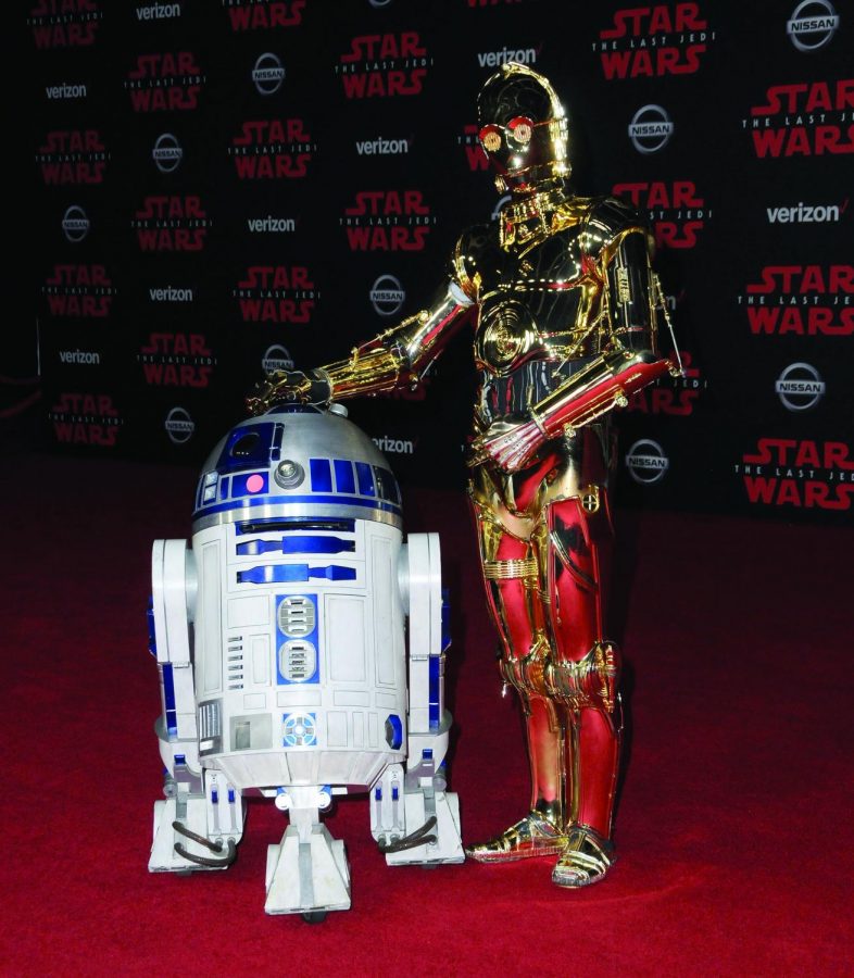 R2-D2 and C-3PO, characters from the Star Wars franchise.