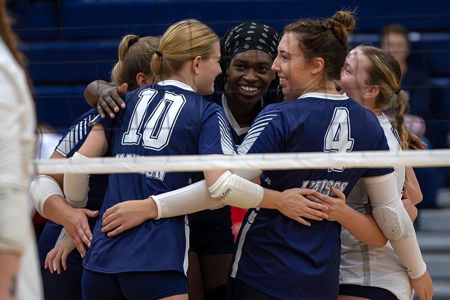 Madison College volleyball players celebrate a point during a match from the 2023-24 season. The team posted a 23-10 record last season.