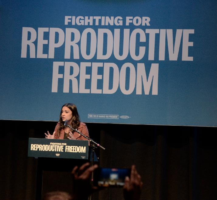 Rep. Alexandria Ocasio-Cortez speaks at the rally. 