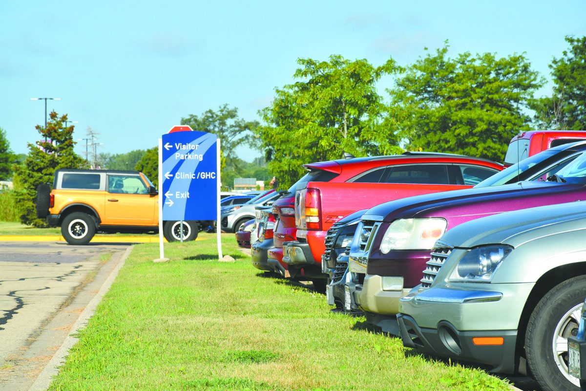 Vehicles fill the main Truax Campus student parking lot.