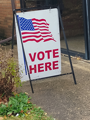 A sign outside a polling place in Madison, Wisconsin, welcomes voters.