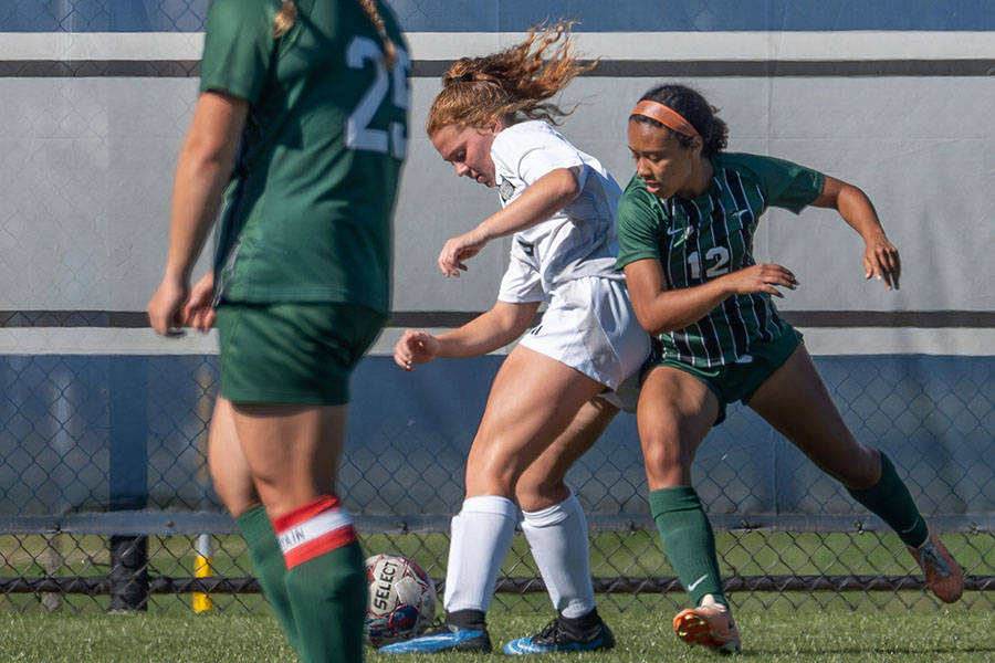 Madison College's Maddie Cadd from Milton defends the ball from her opponent during a match earlier this season.