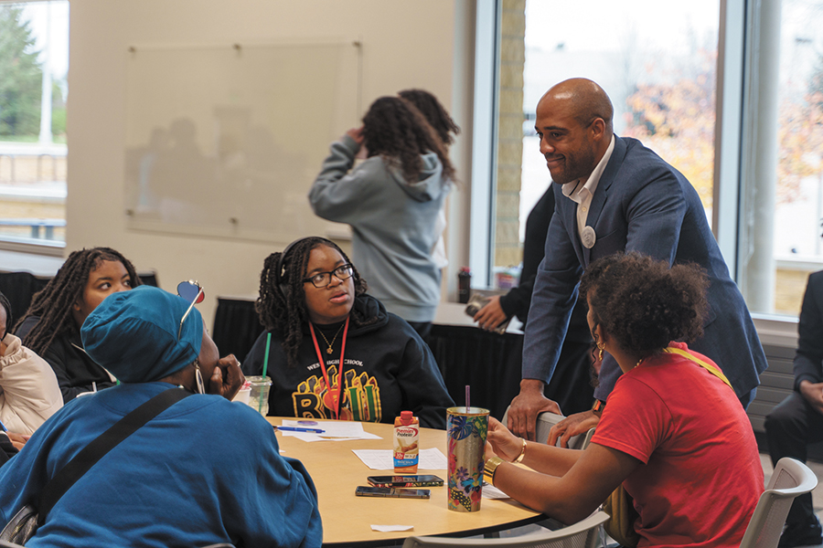 Former Lieutenant Governor Mandela Barnes speaks to high school Black Student Union members while they work on an activity during the National BSU Conference at Madison College on Nov. 22, 2024.