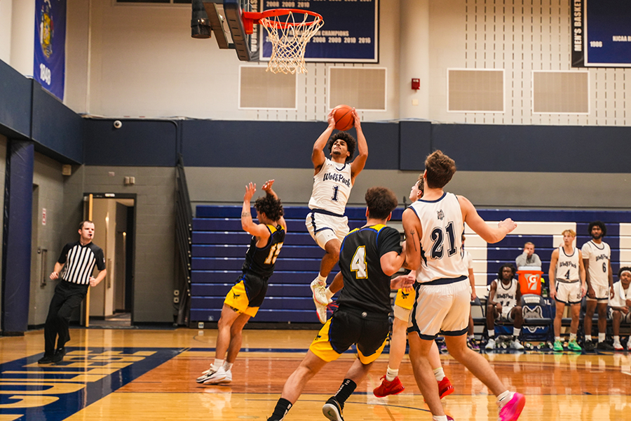 Jevon Campbell (1) scores off a jump shot during his team's victory over Blackhawk on Wednesday, Nov. 21, 2024.