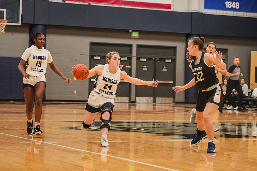 Camilla Hauser (24) is about to pivot and swing around her opponent during a home game on Wednesday, Nov. 20, 2024.