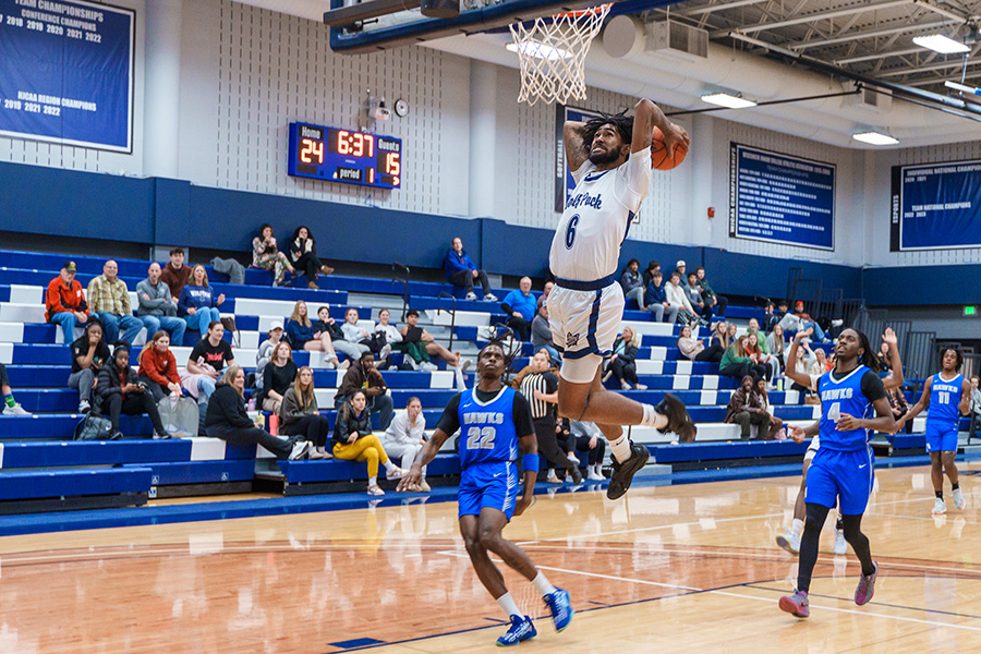 Madison College men’s basketball player Ryen Jones dunks the ball during his team’s 80-63 win over Harper College on Jan. 28. The WolfPack is now ranked No. 20 in the NJCAA Division II poll and an 18-4 overall record.