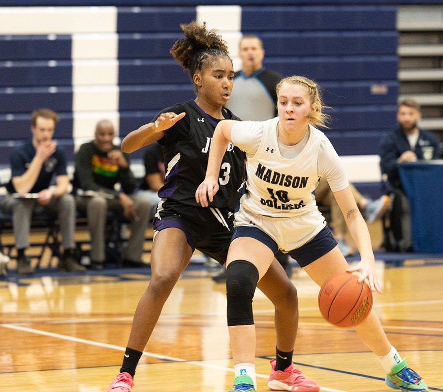 Keelyn Zwirschitz (10) drives toward the hoop against Joliet Junior College on Feb. 4. The WolfPack posted a 60-52 victory.