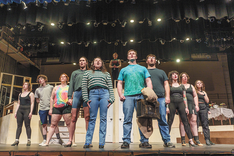 Members of the cast of Cabaret sing the last musical number of the first act during rehearsal on March 1.