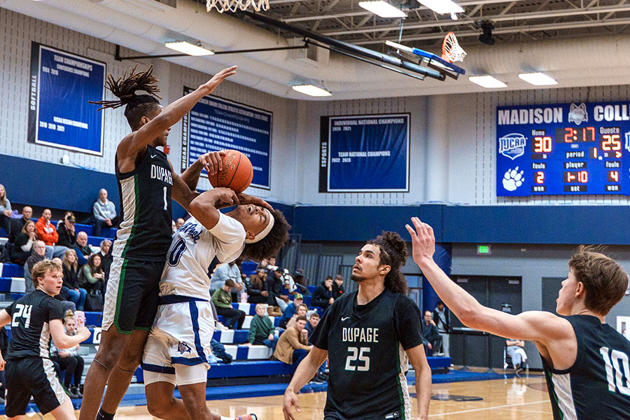 Madison College’s George Whaley IV gets fouled by a College of DuPage player during the WolfPack’s 77-69 loss at home on Feb. 11.